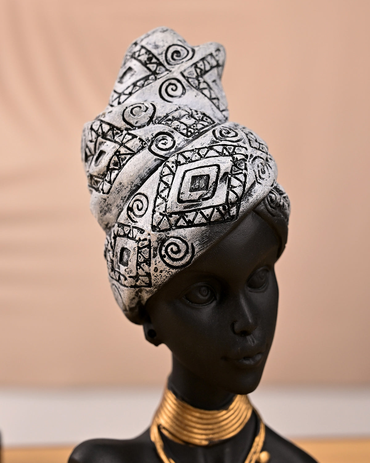 Elegant African Empress sculptures with regal decorative details