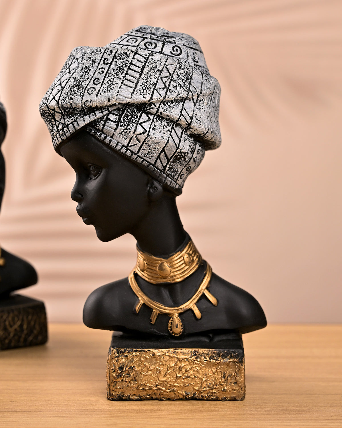 Regal African queen figurines in an artistic sculpture set
