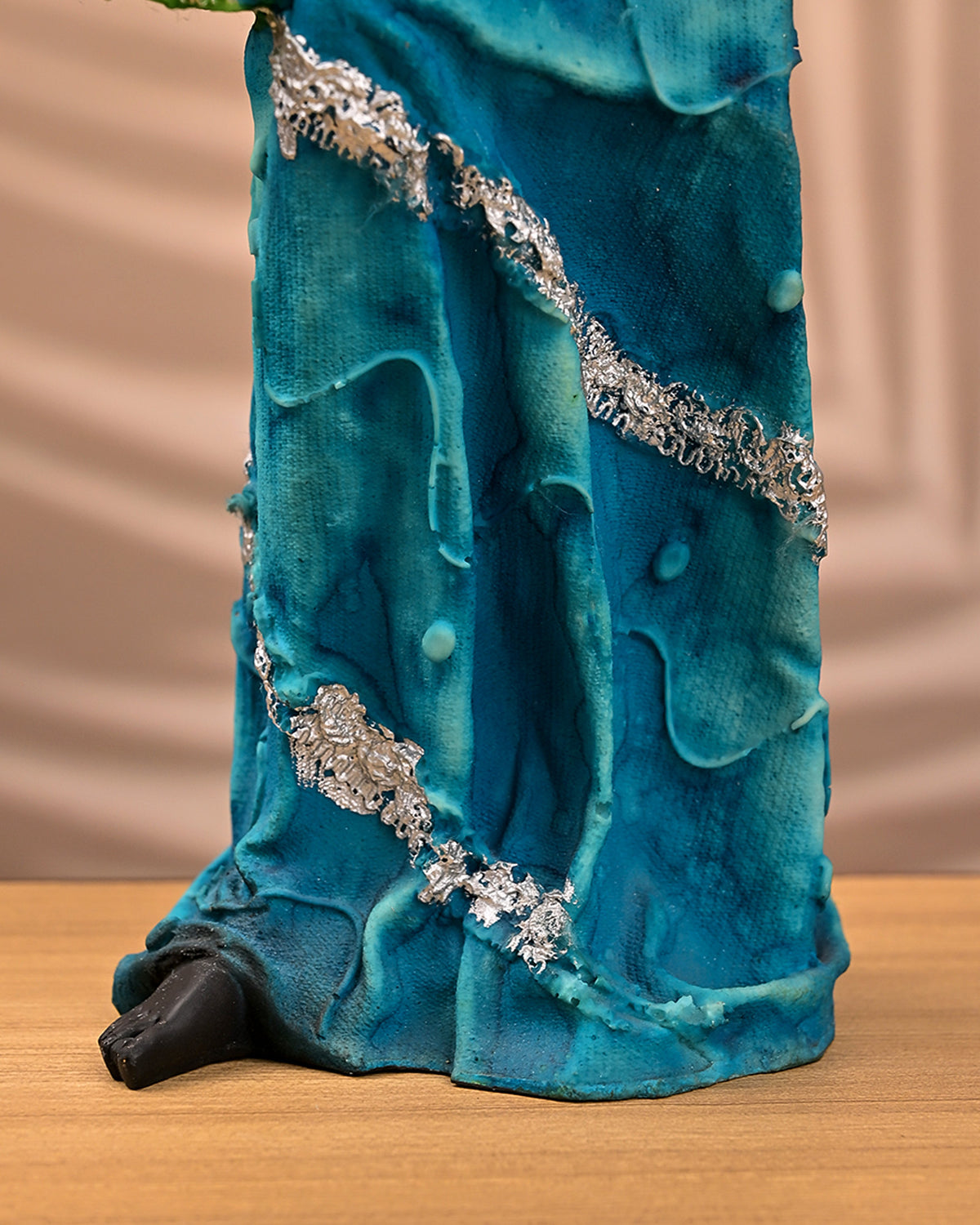 Elegant African female statue with drum and detailed craftsmanship