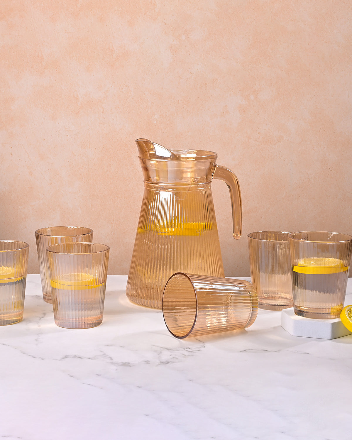 Amber-tinted glass jug set with an elegant warm-toned design