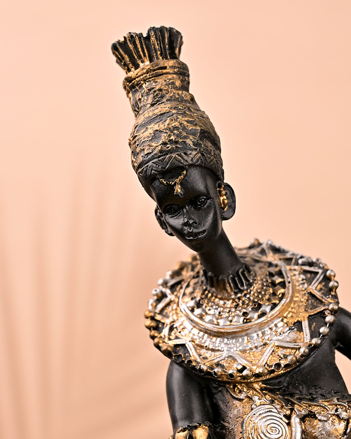 Decorative African women figurine with an antique finish