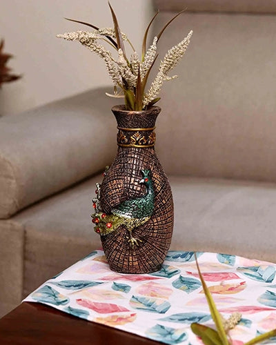 Intricately crafted vase with peacock embellishments