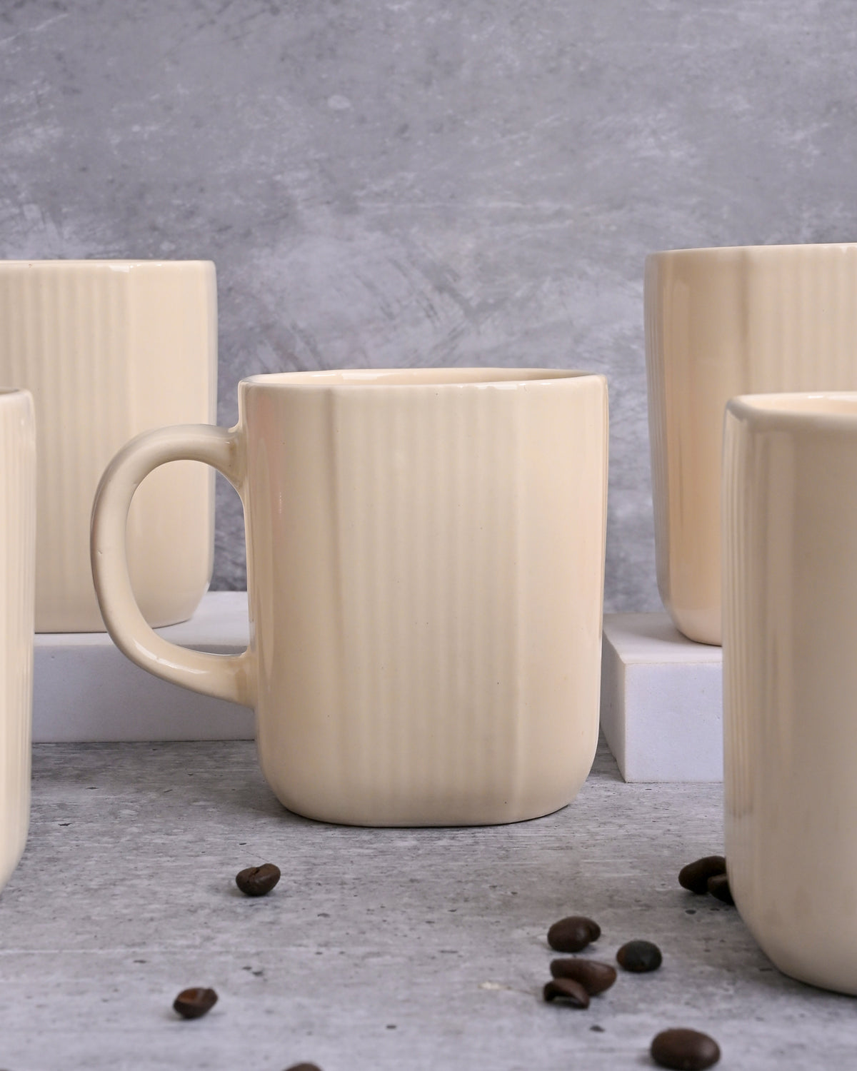 Stylish beige coffee mugs