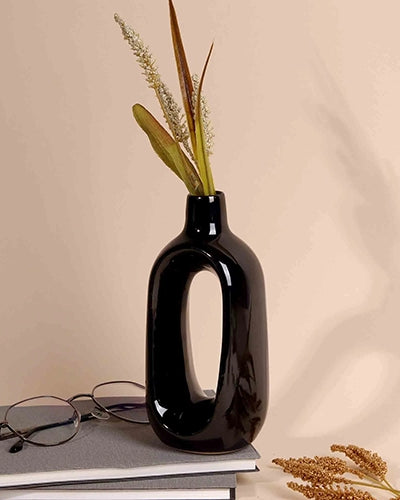 Black Embrace flower vase with elegant sculptural design