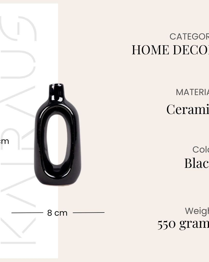 Decorative black hollow vase for contemporary interiors