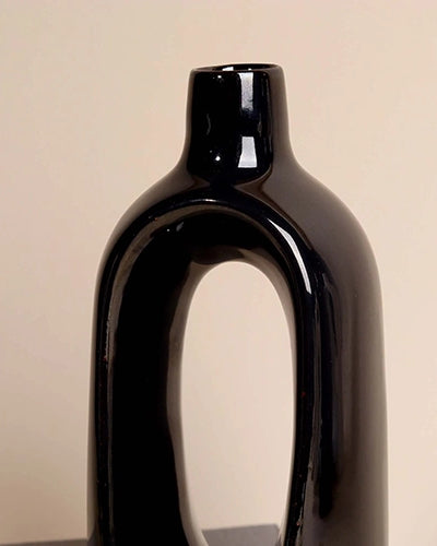 Sleek sculptural black vase for stylish home decoration