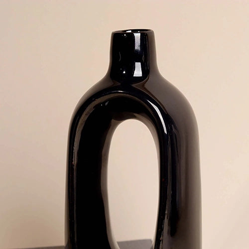 Sleek sculptural black vase for stylish home decoration