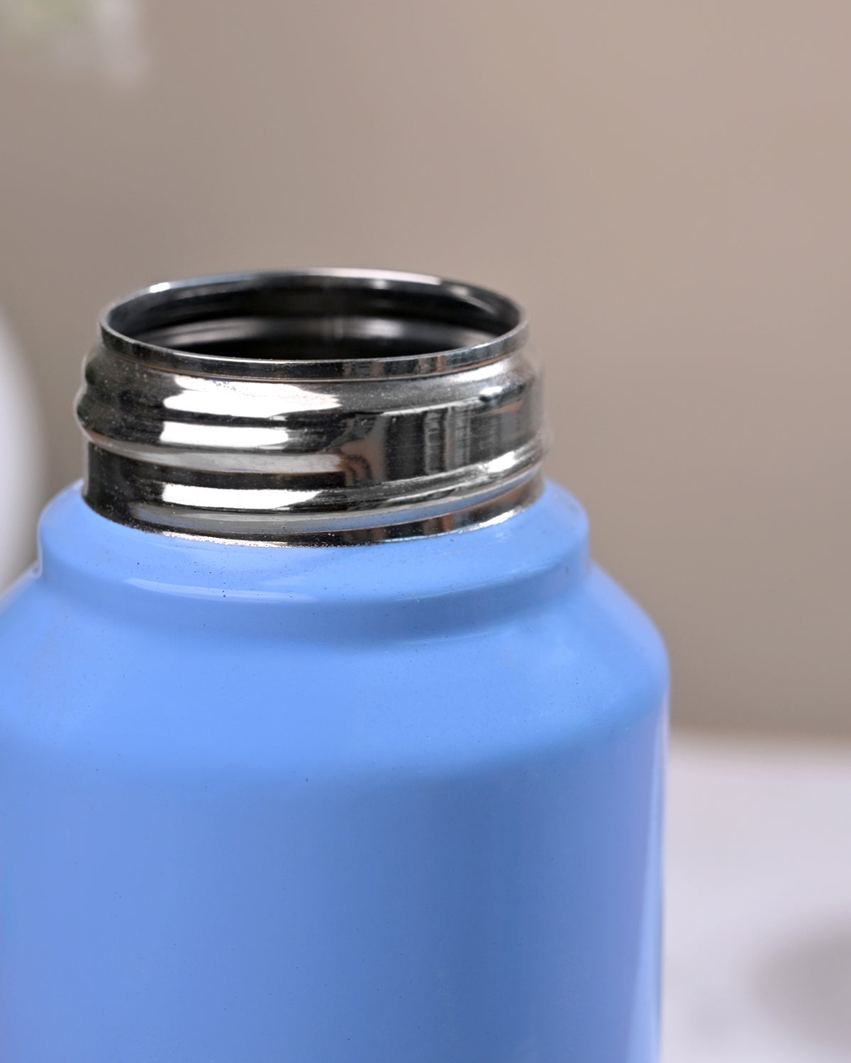 Blue Stainless Steel Water Bottle showcasing its durable metal body