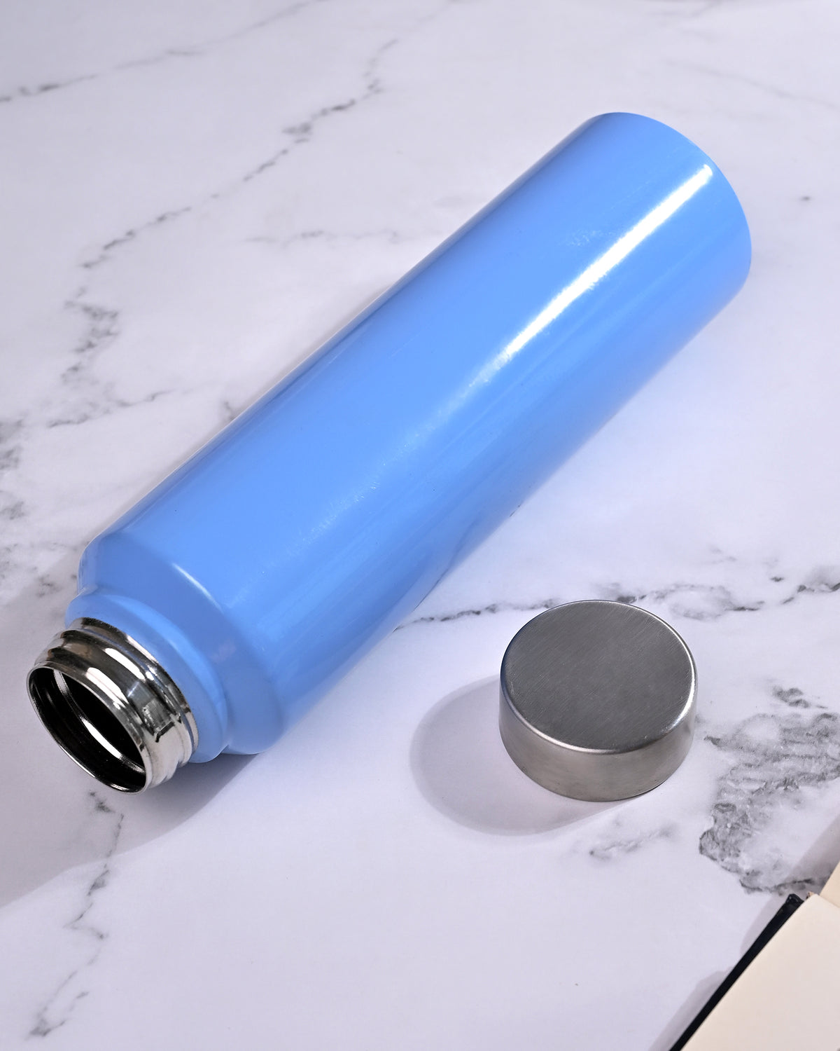Blue Stainless Steel Water Bottle with a minimalist design