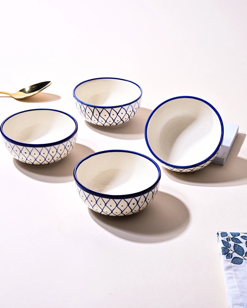 Stylish blue ceramic serving bowls with glossy finish
