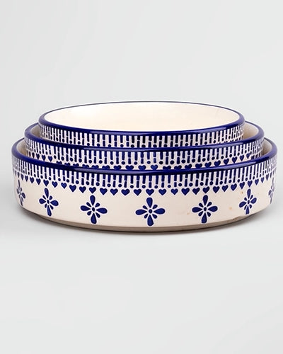 Set of three blue and white ceramic bowls