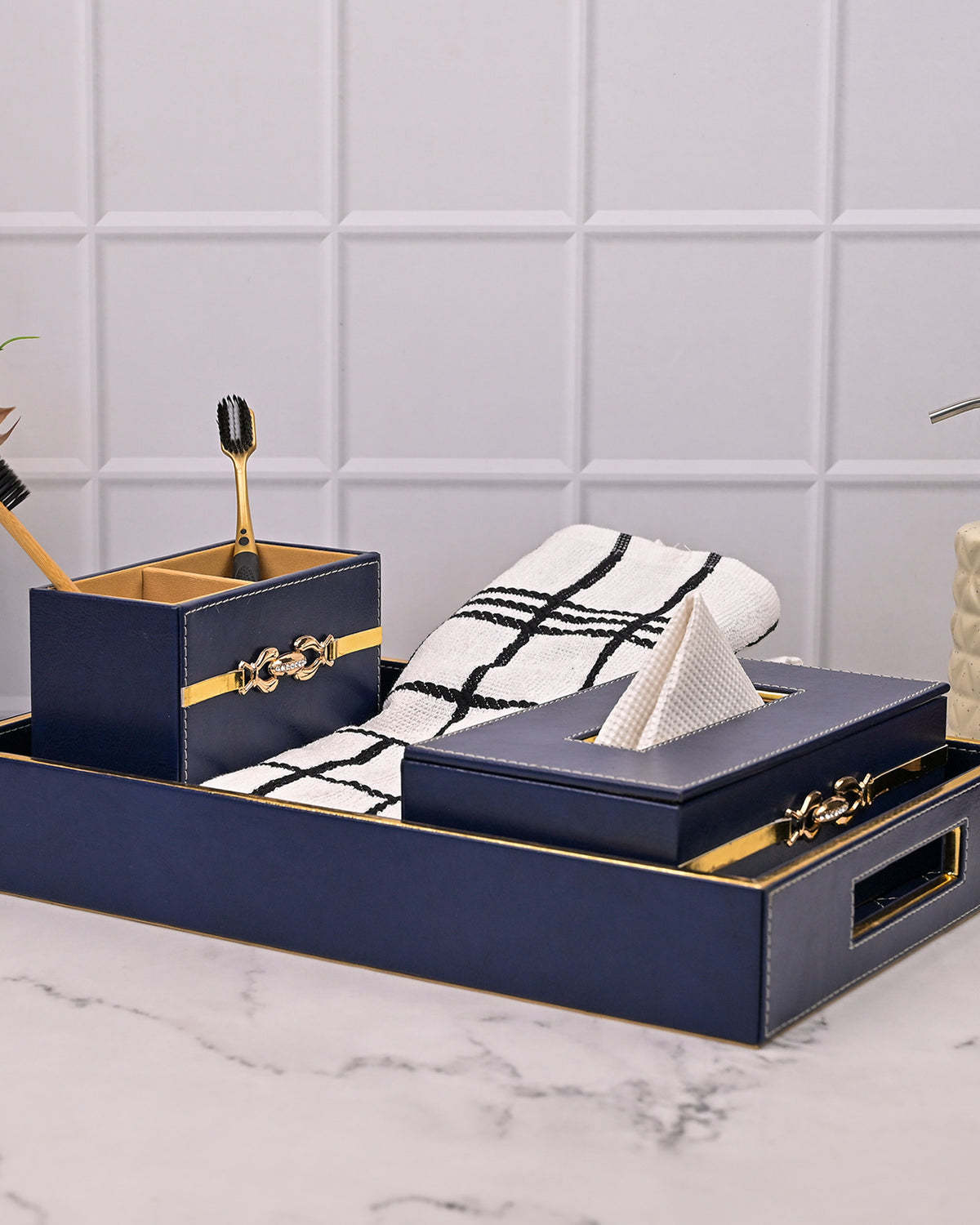 Blue leather bathroom accessory set with elegant design