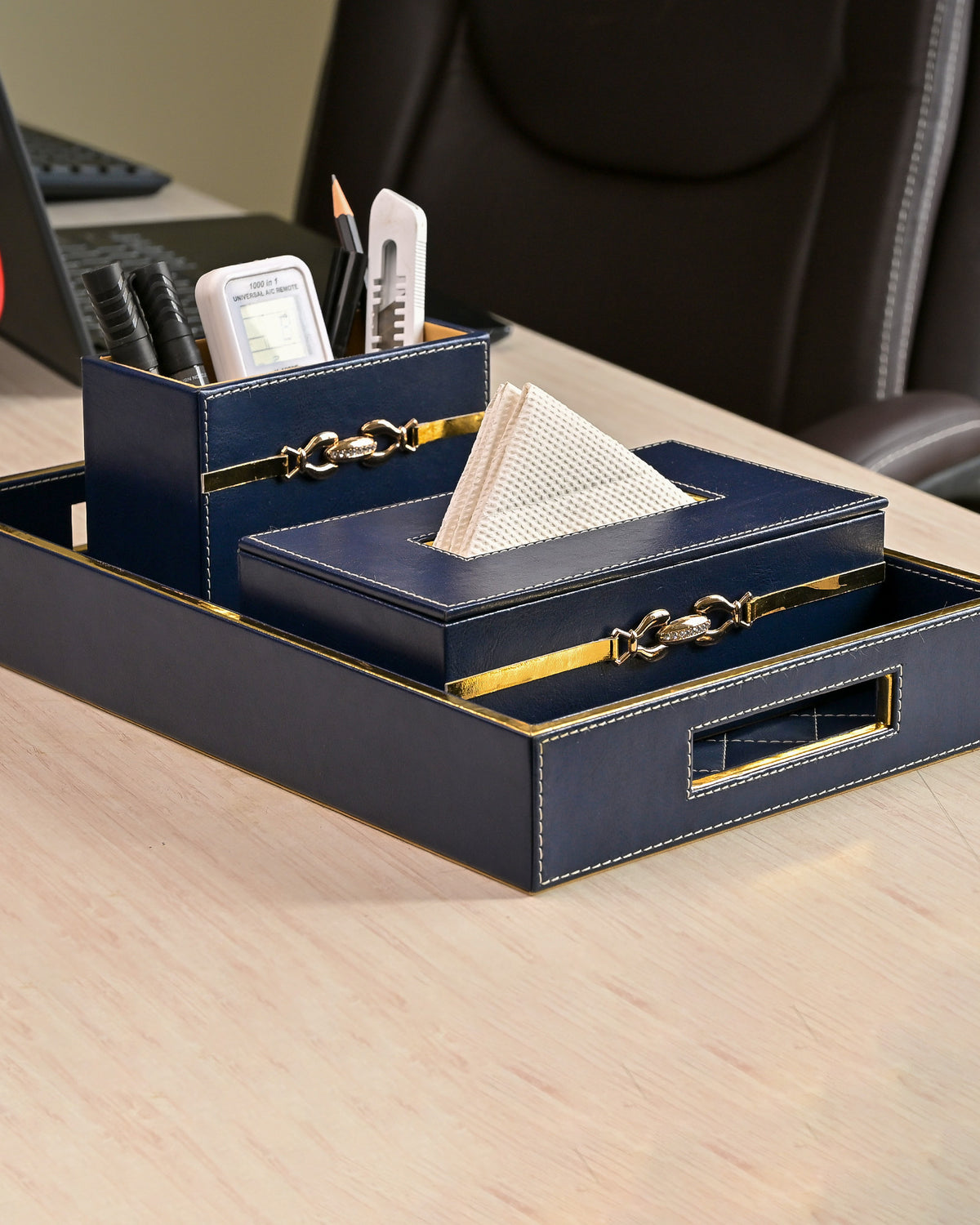 Blue leather desk organiser set for office workspace