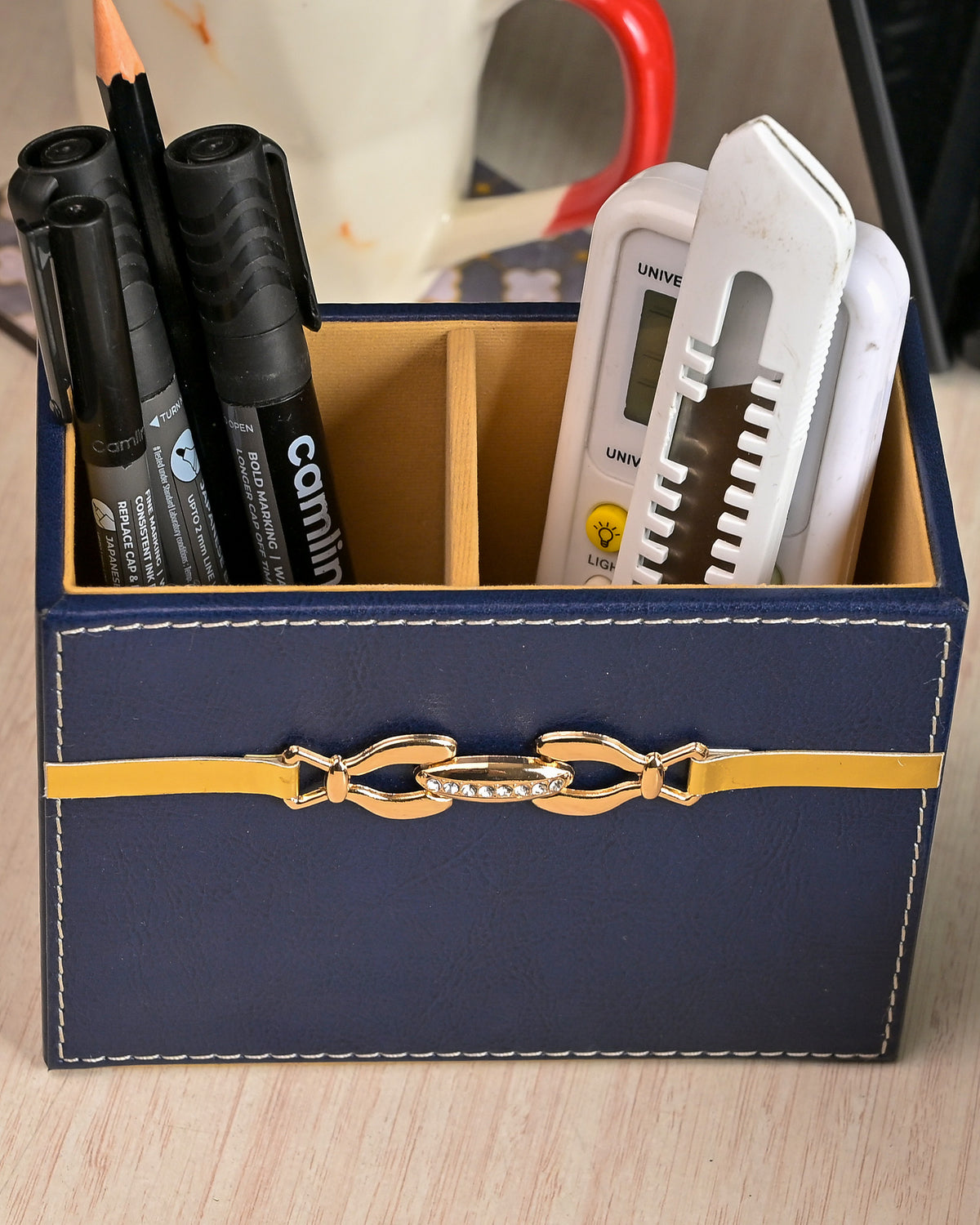 Luxury blue leather desk organiser for executive workspace