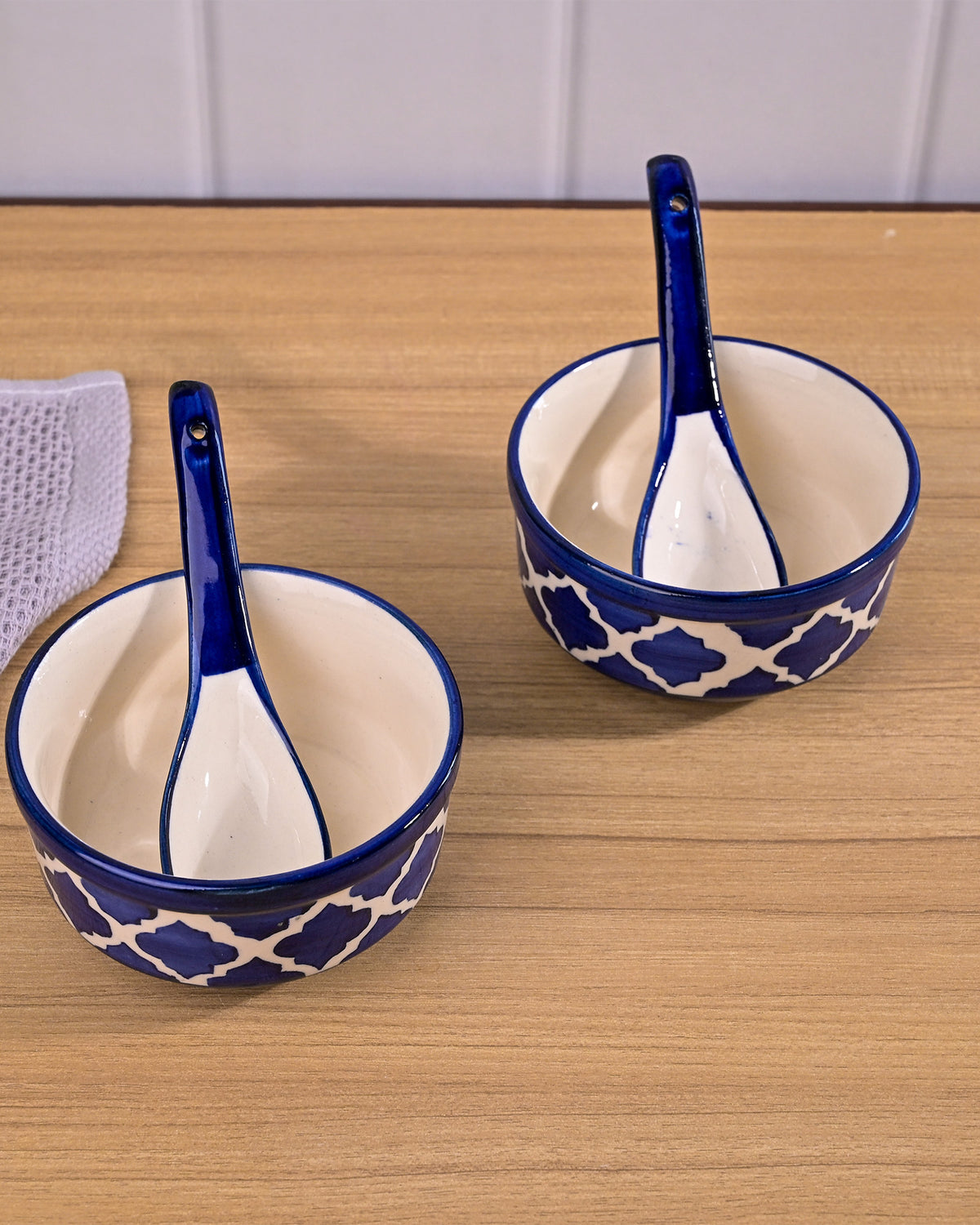 Blue porcelain soup bowl set with matching spoons