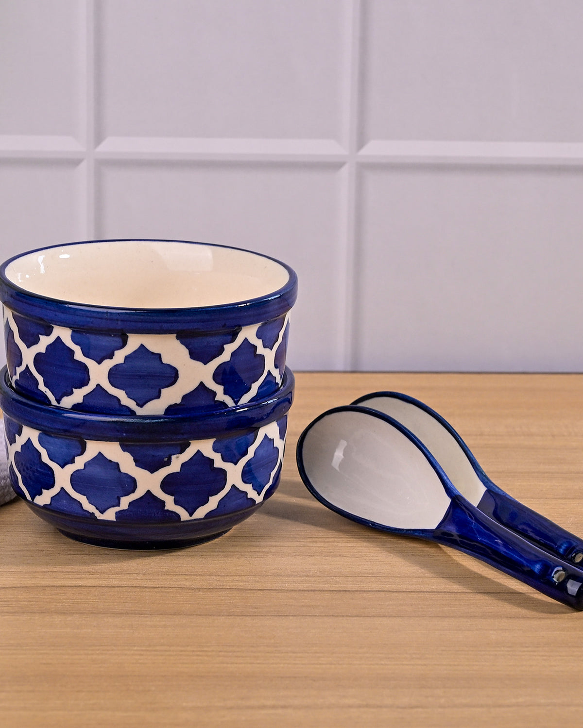 Decorative blue soup bowls with coordinating spoons