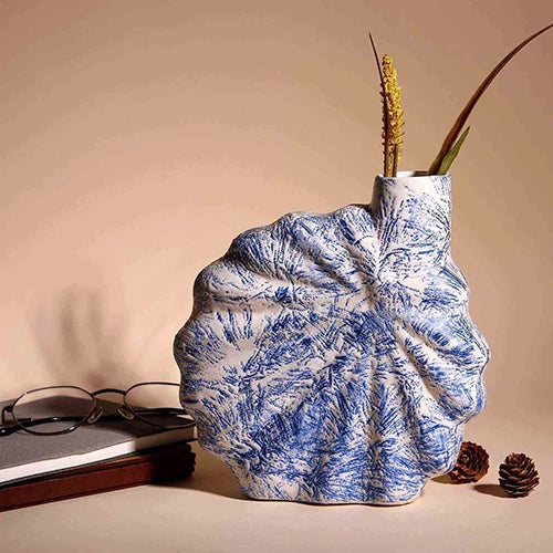 Modern blue flower vase with textured shell design