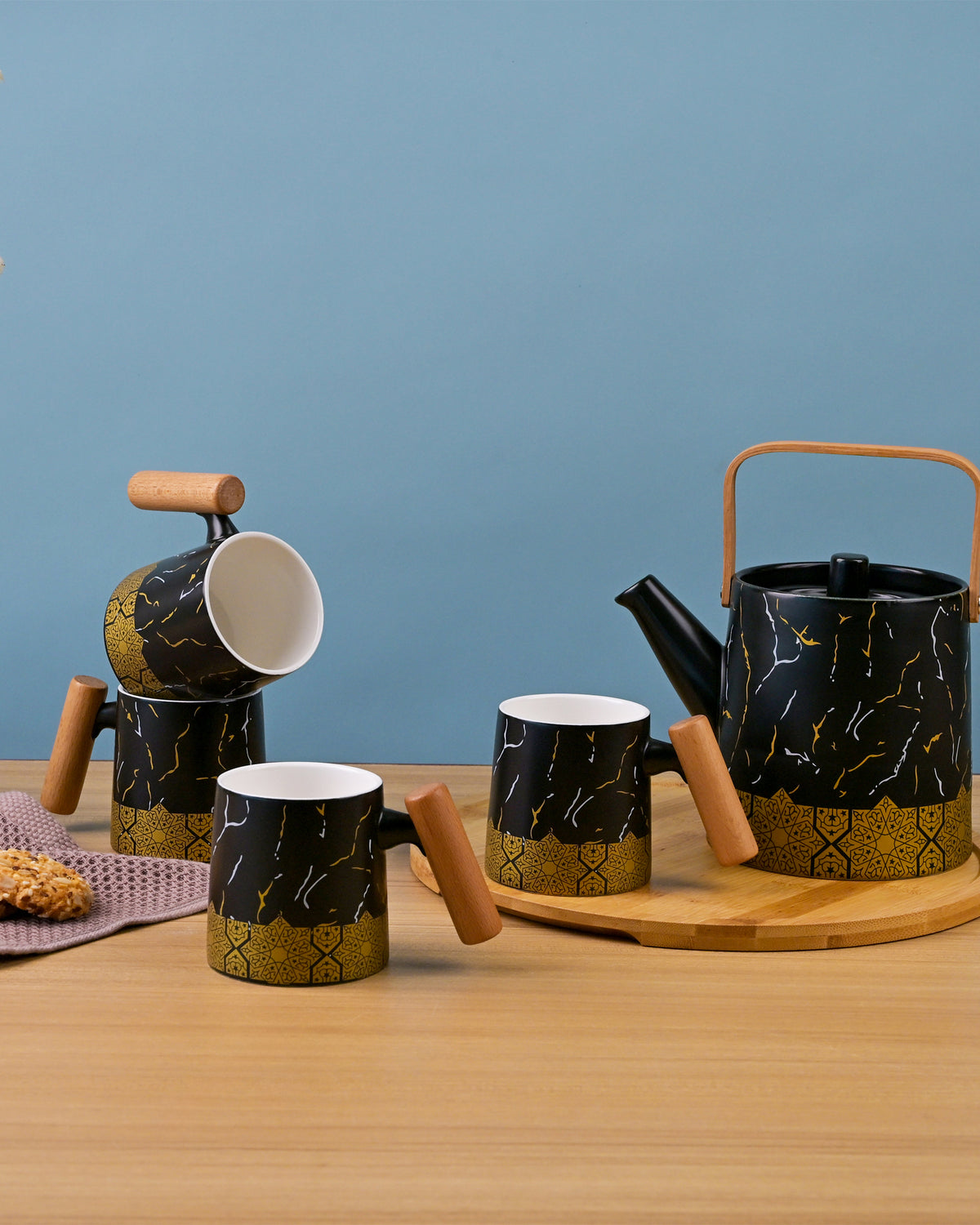 Elegant Black Tea Set with Bronze Decorative Accents