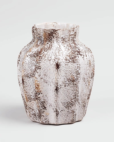 Decorative brown vase featuring a scalloped textured finish