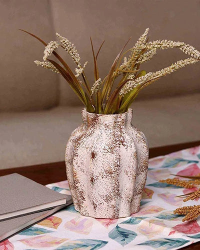 Elegant scalloped vase in a warm brownish tone