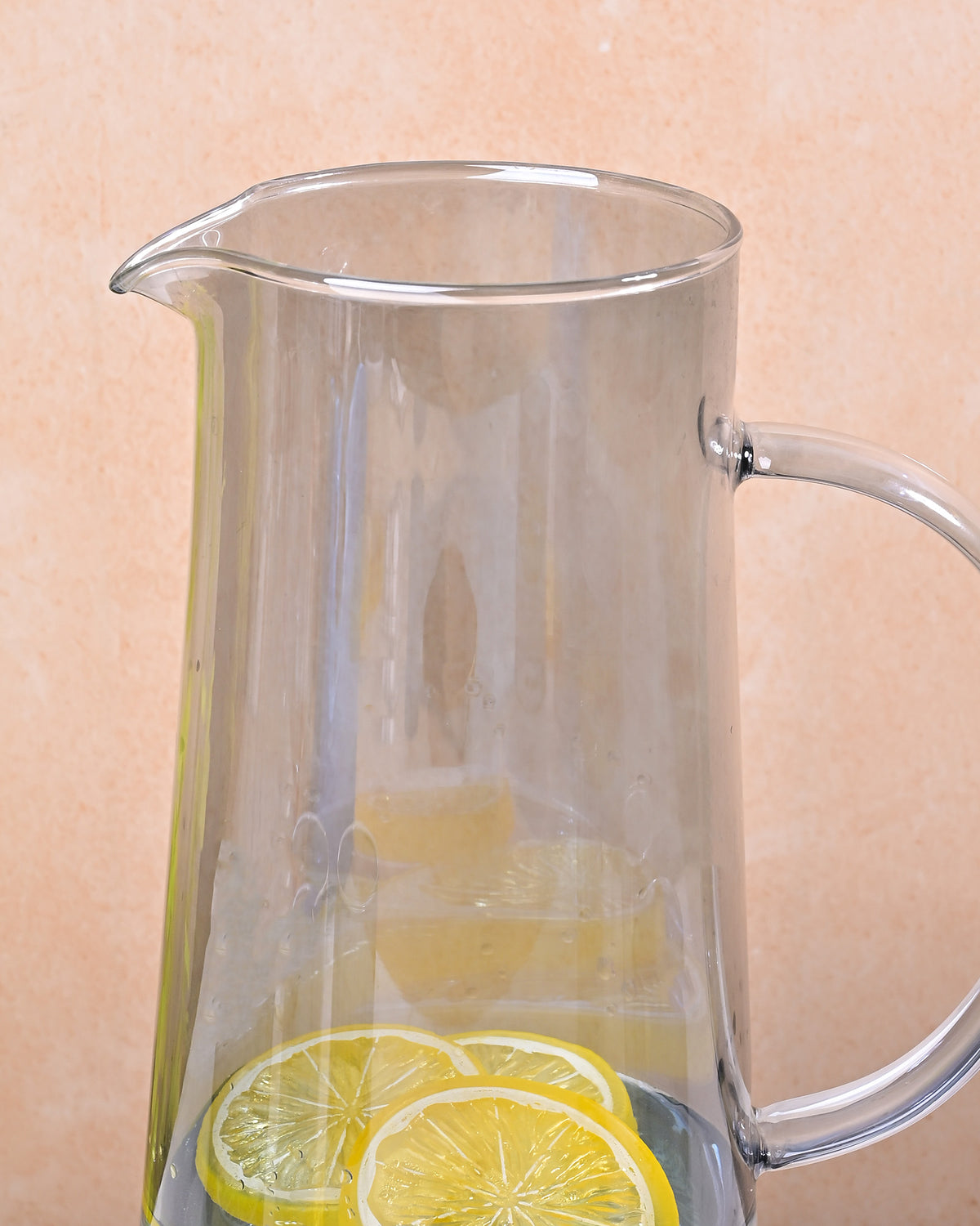 Modern glass carafe with gold lid for dining table decor