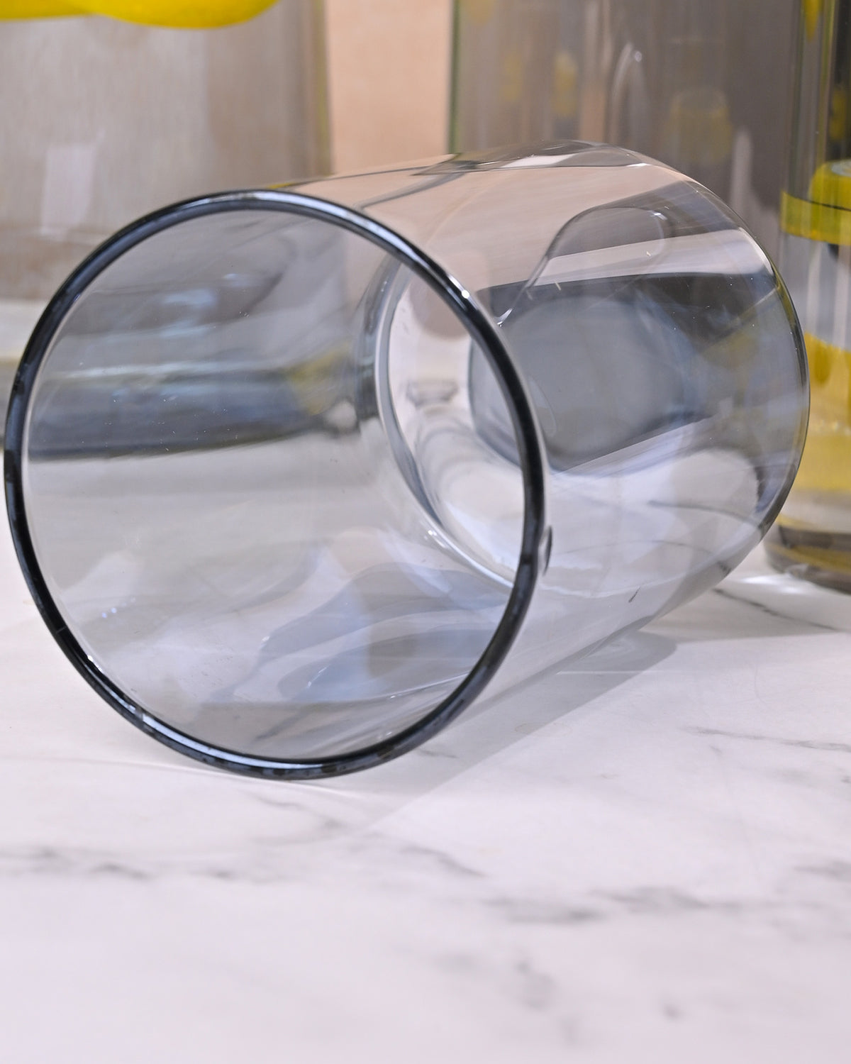 Minimalist glass carafe with golden lid for kitchen and dining