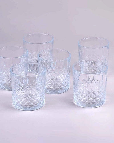 Six classic whiskey glasses displayed on a table