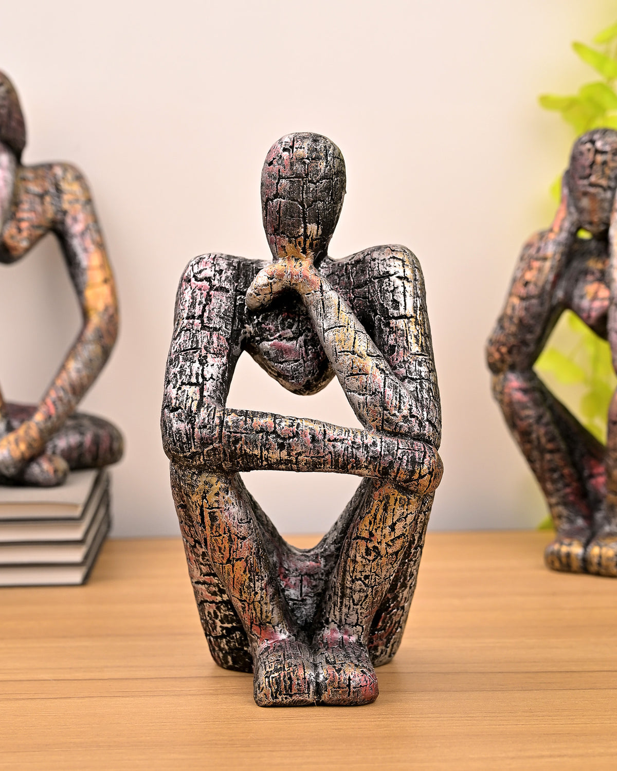 Copper Thinking Trios sculpture set displayed on a tabletop