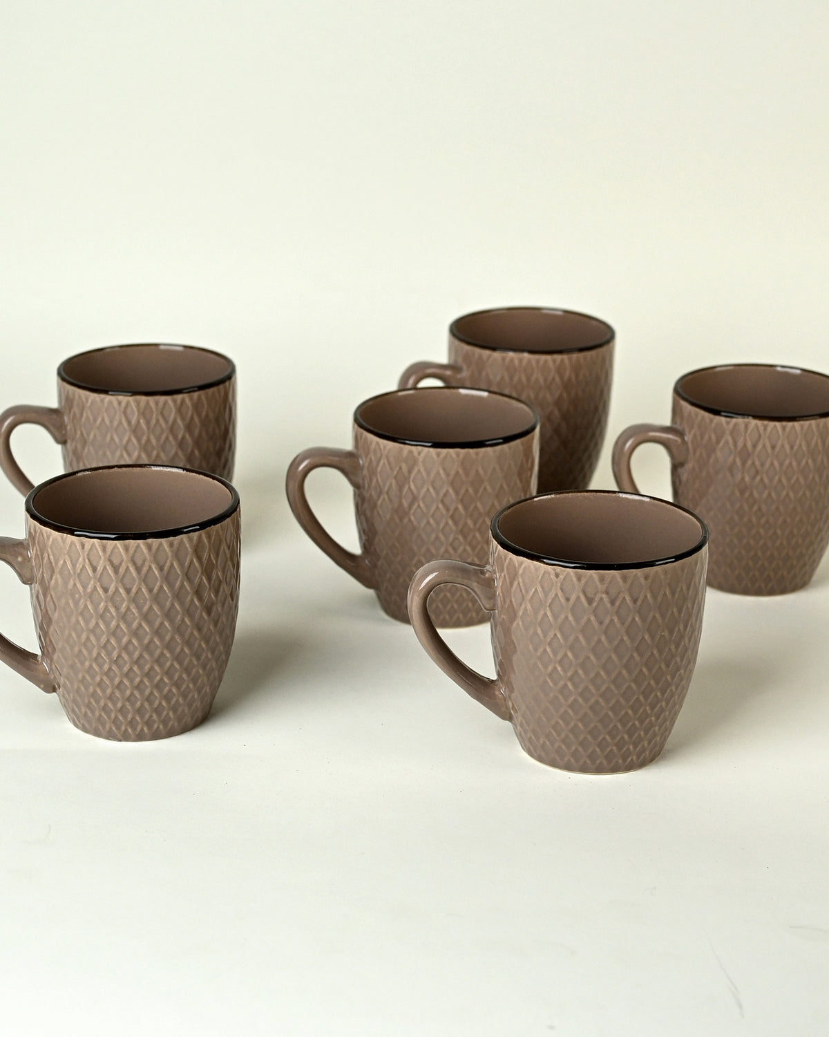 Earthy brown patterned ceramic mugs