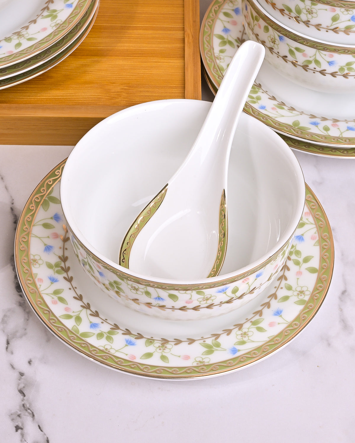 Stylish porcelain bowls with matching spoons set