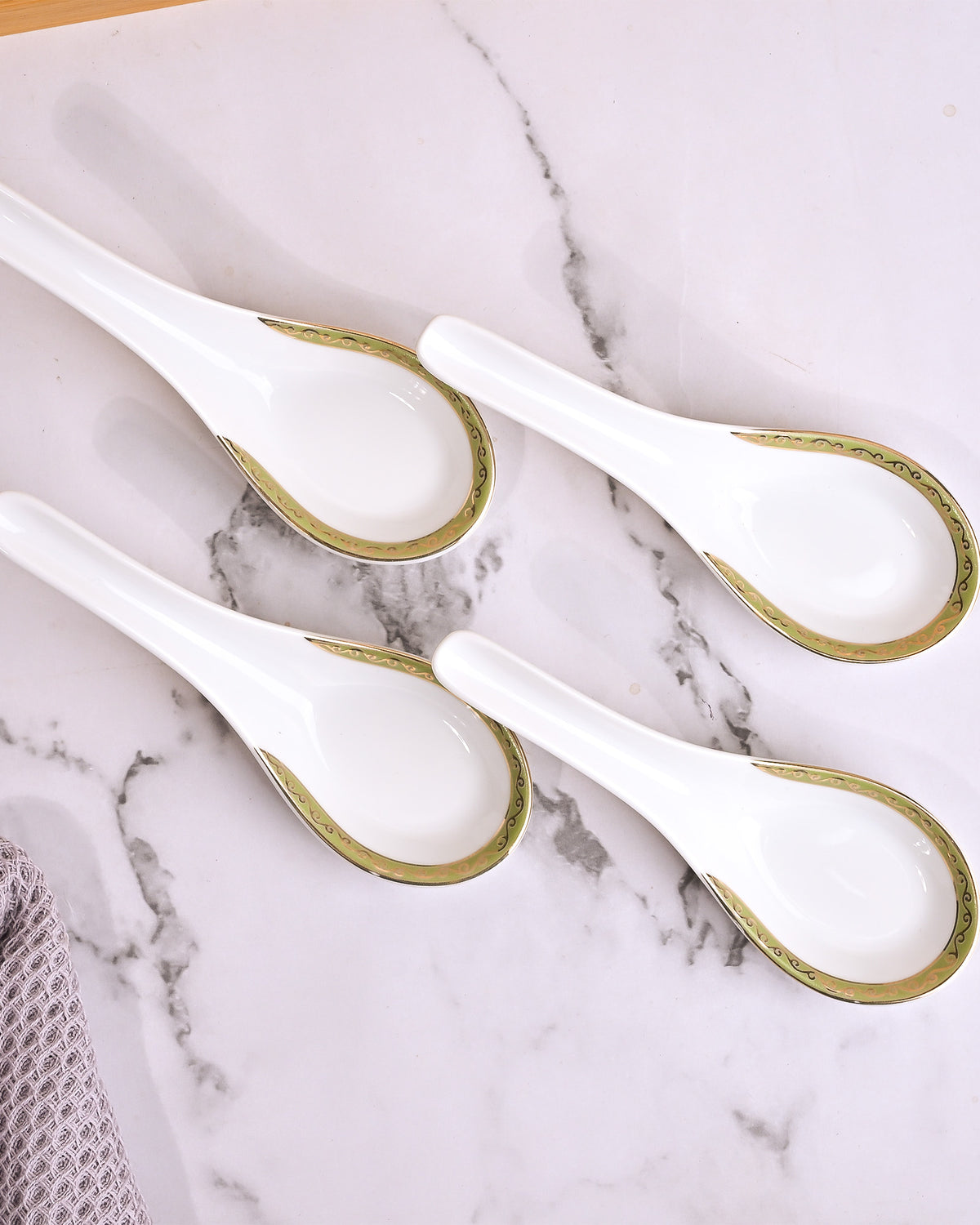Minimalist porcelain bowl set with elegant spoons