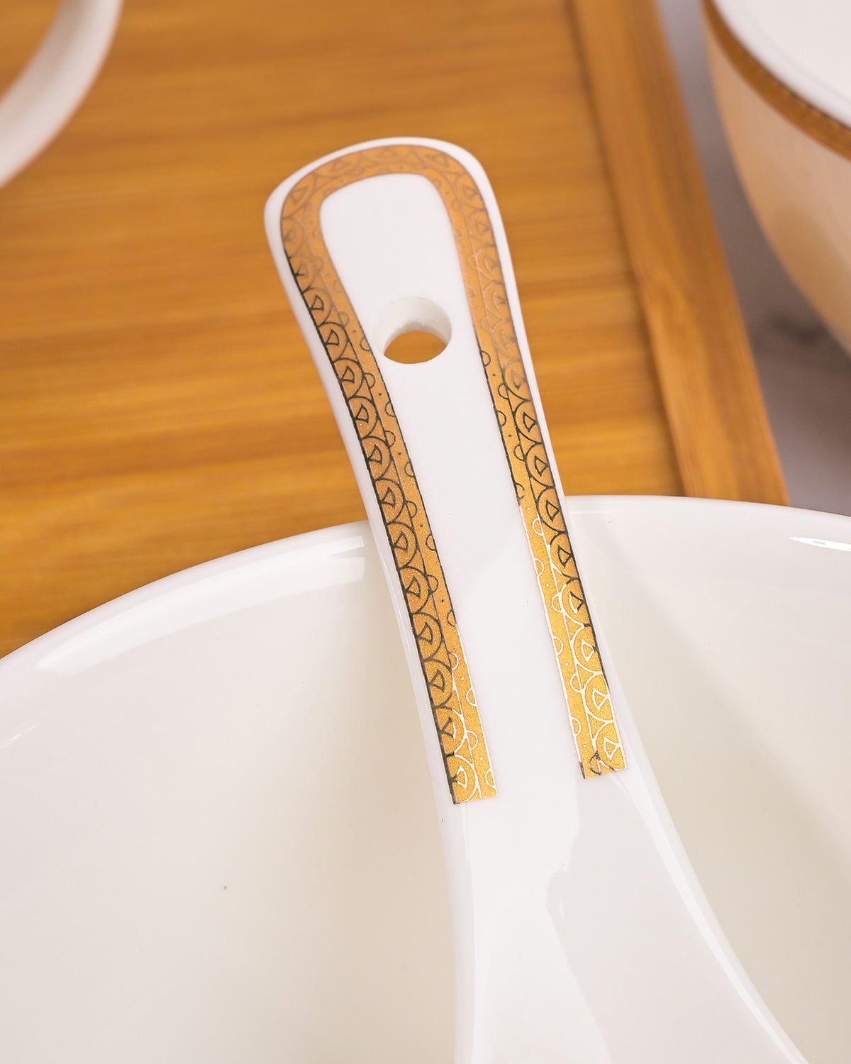 Classic white porcelain bowls with matching spoons