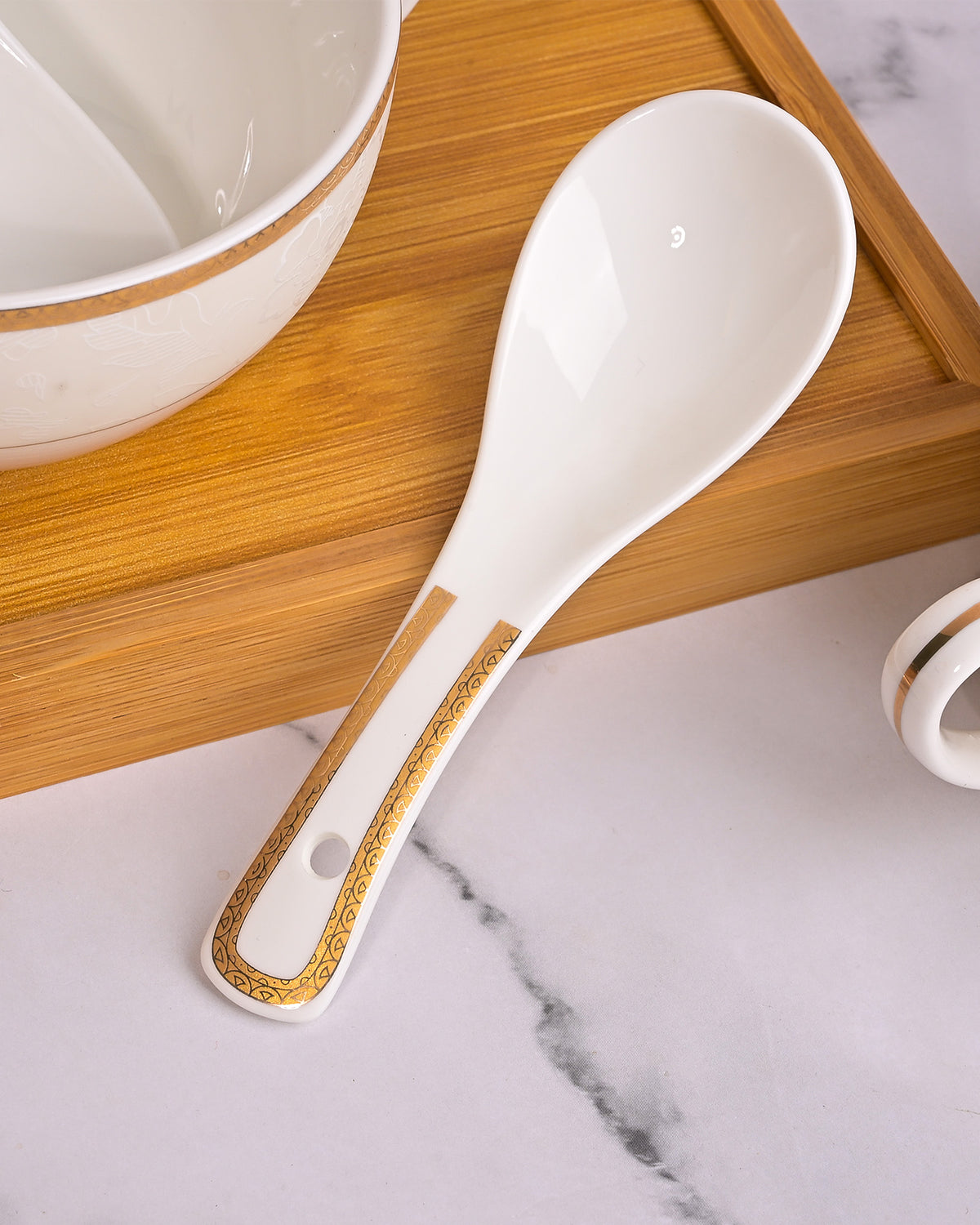 Set of two white porcelain bowls with ceramic spoons