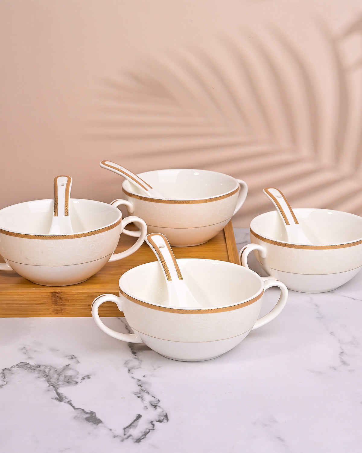 Set of 4 elegant white porcelain bowls with spoons