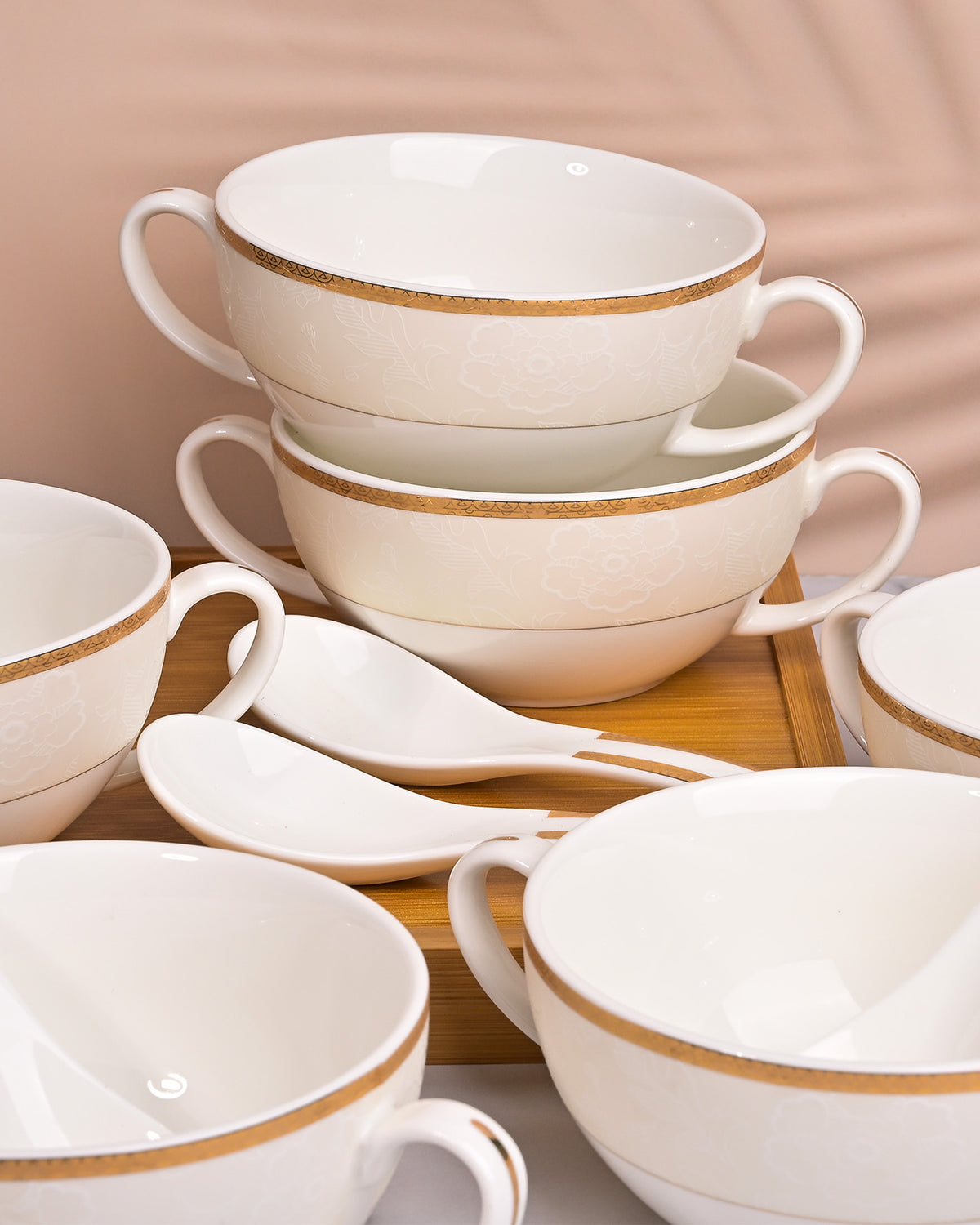 Minimalist white porcelain bowls and spoons for everyday dining