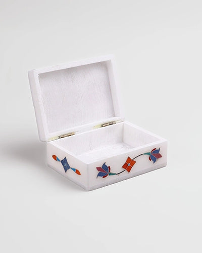 Handcrafted white marble jewelry box with delicate floral patterns