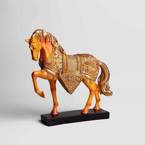 Pair of golden horse figurines for home decoration