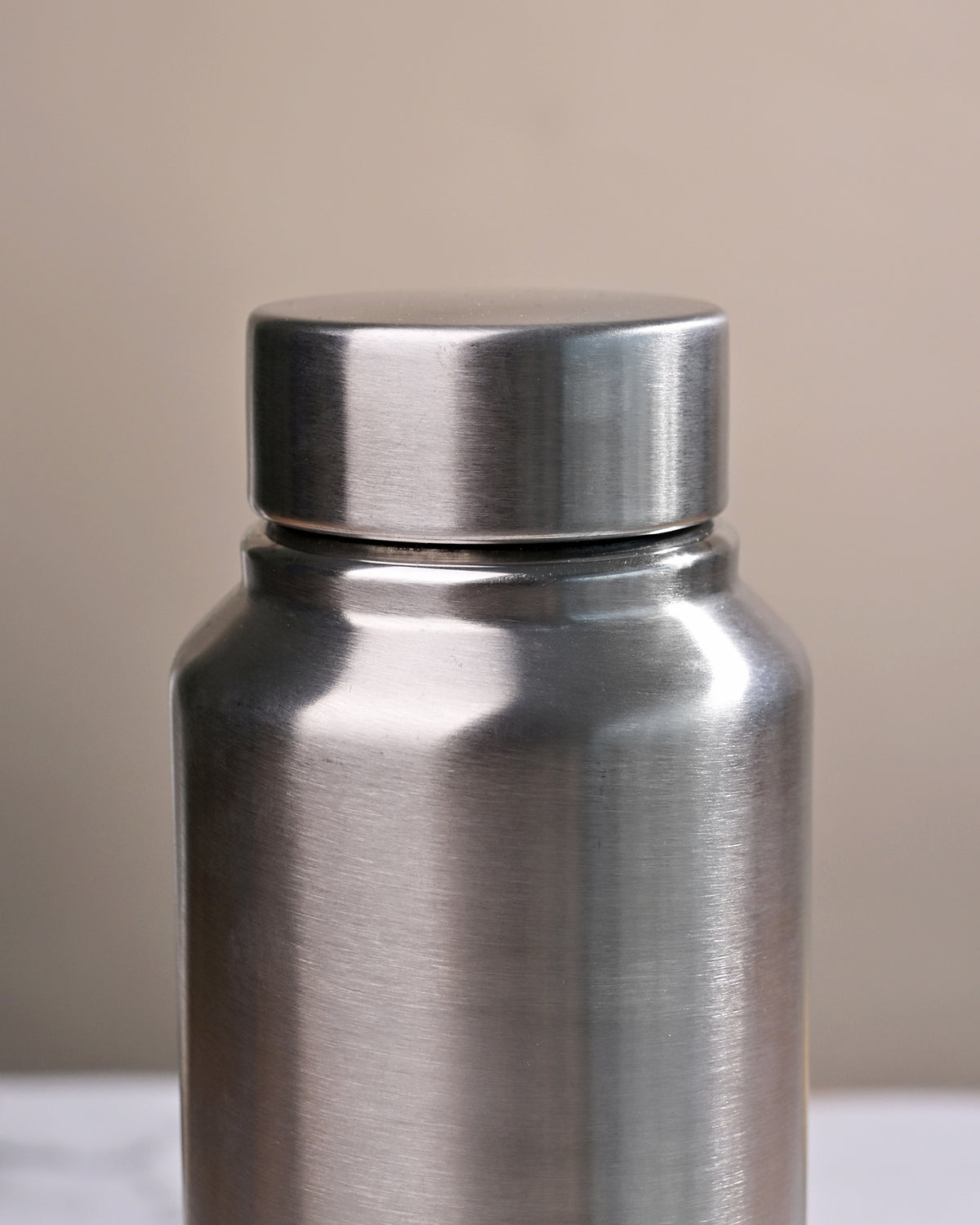 Grey Stainless Steel Bottle displayed against a clean background
