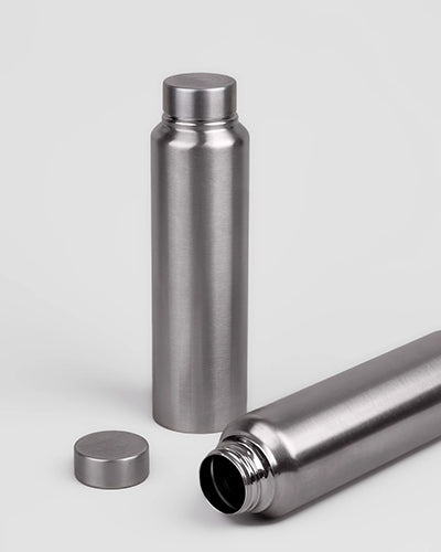 Grey Stainless Steel Bottle photographed in natural lighting