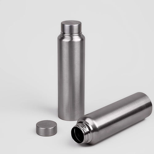 Grey Stainless Steel Bottle photographed in natural lighting