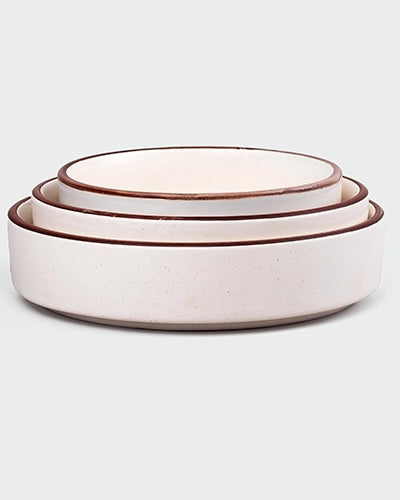 Minimalist ivory bowls for dining and serving