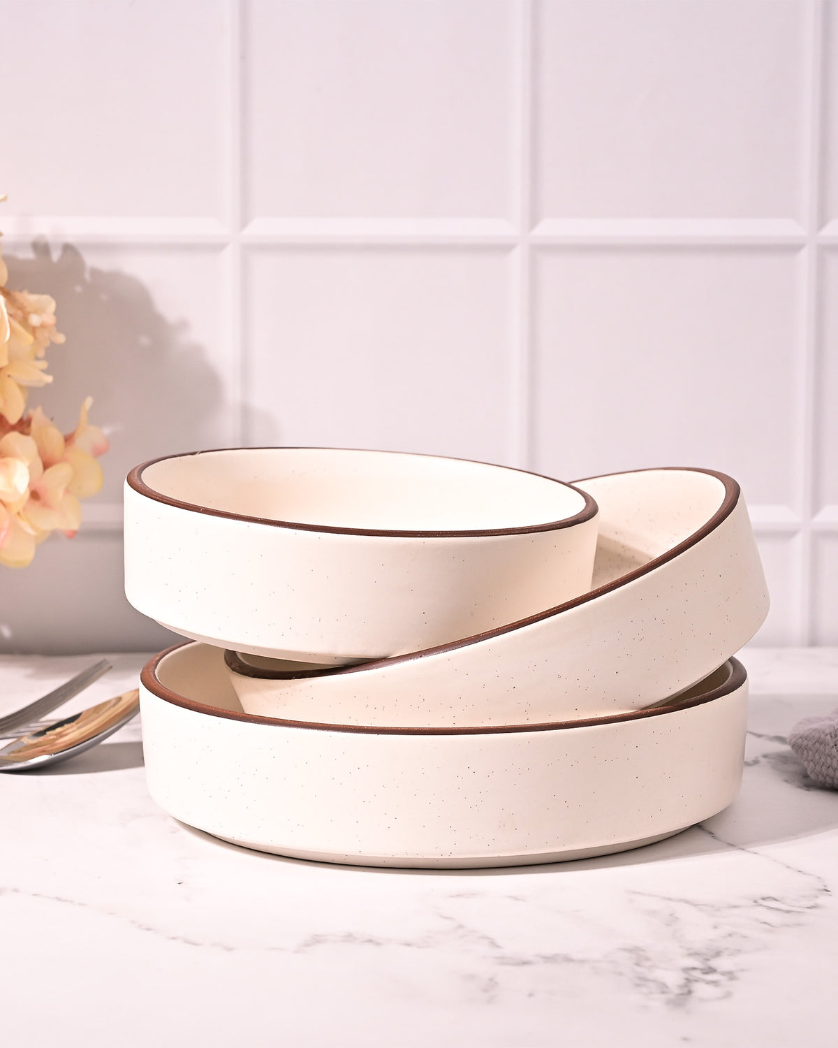 Minimalist ivory bowls for snacks and serving