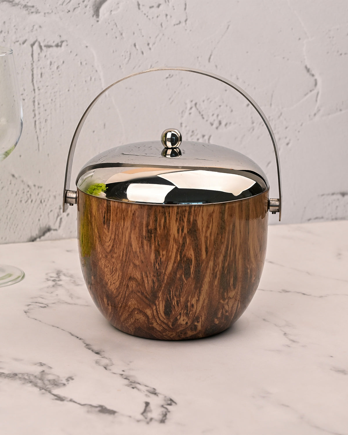 Stainless Steel Ice Bucket Displayed on a Sophisticated Serving Counter