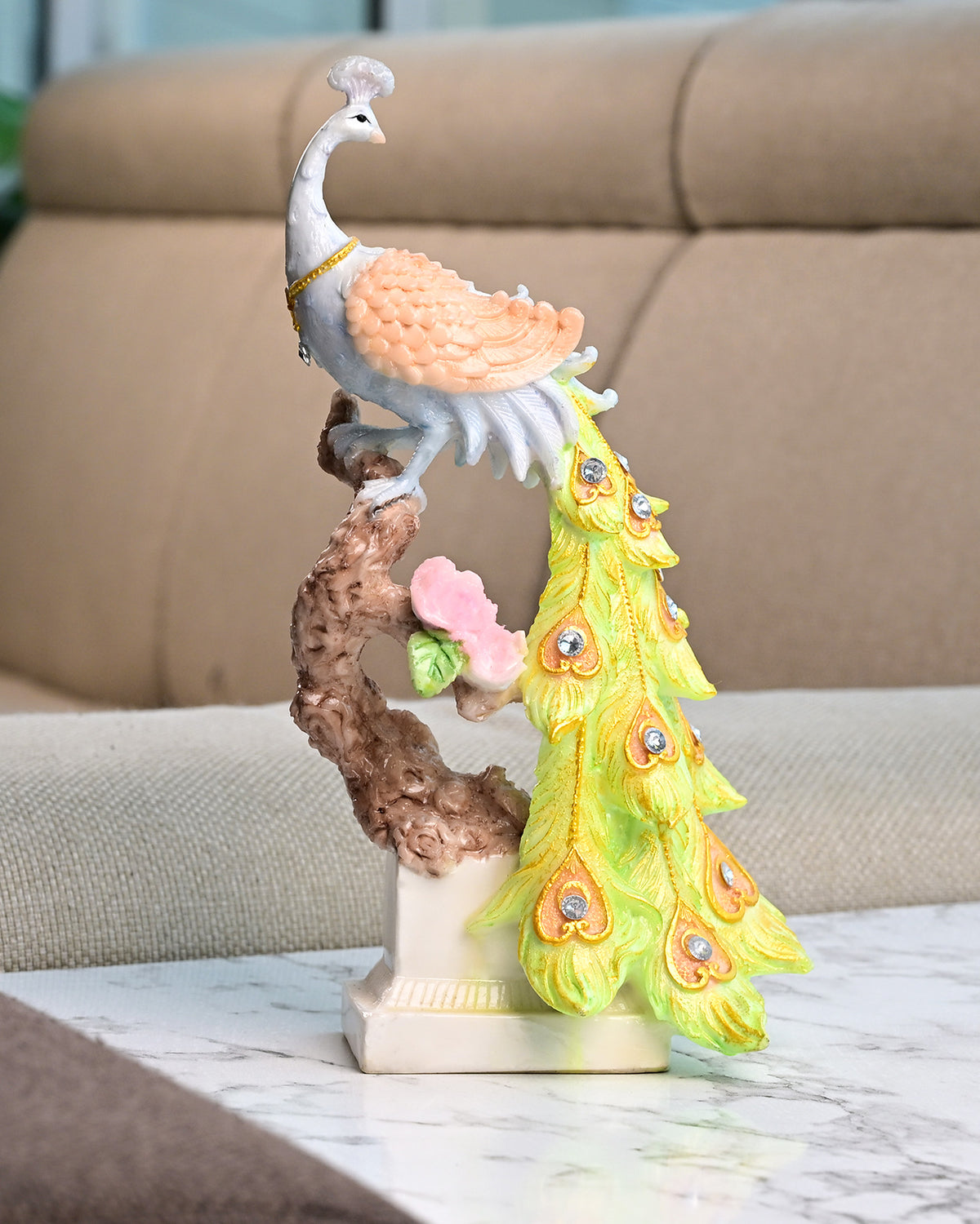 Majestic sunrise peacock statue with vibrant feather details