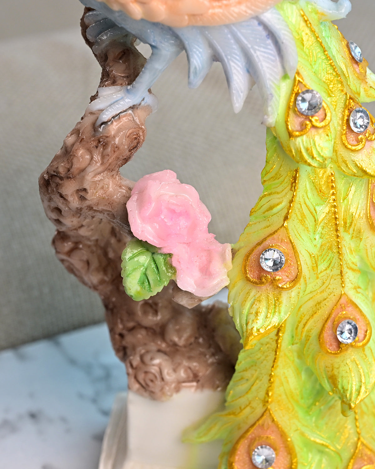 Decorative majestic peacock sculpture with colorful feathers