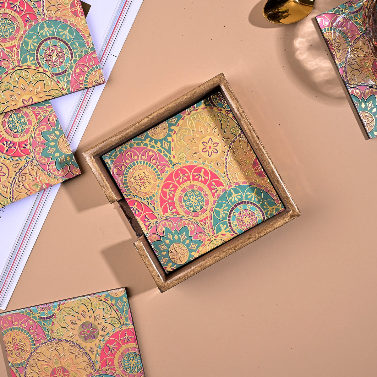 Colorful Mandala printed coasters arranged together