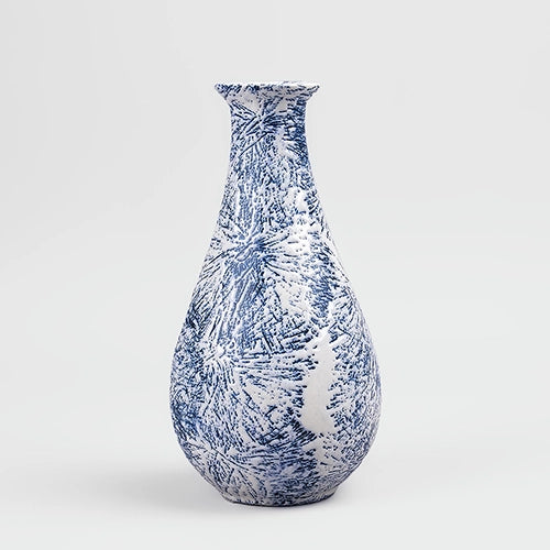 Decorative midnight blue bottle vase with textured surface
