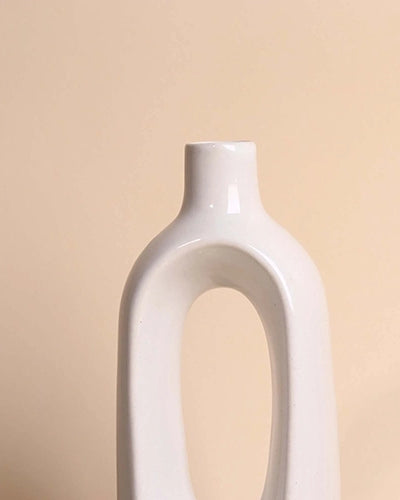 Sculptural white vase with a unique hollow design