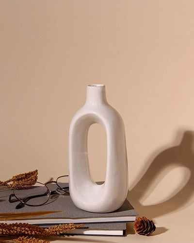 Contemporary hollow vase in a simple white finish
