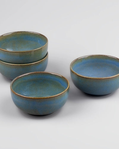Set of four mint green porcelain bowls